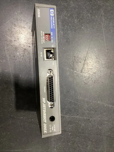 J3263-69011 - HP JetDirect 300X External Print Server 1 x Parallel 10/100 Ethernet RJ-45 Interface Connector